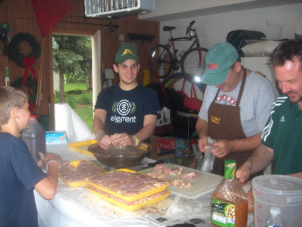 Trimming and seasoning chicken