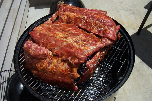 Ribs loaded in smoker