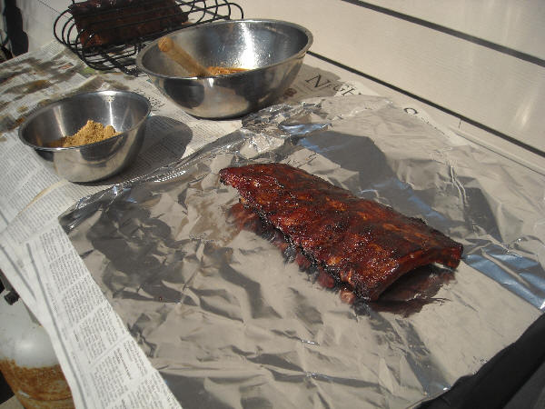 Ribs placed bone side down on foil